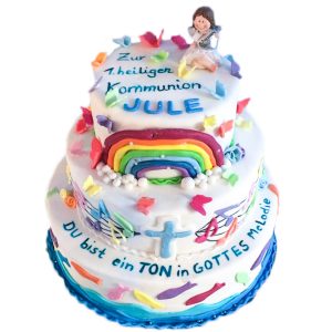 Dreistöckige Kommunionstorte "Ton in Gottes Melodie" mit Regenbogen, Fischen und Schmetterlingen