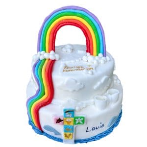Zweistöckige Kommunionstorte "Regenbogen" mit detailliertem Kreuz