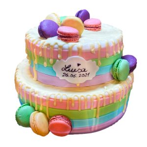 Bunte zweistöckige Torte mit bunten Macarons und Tropf-Dekor