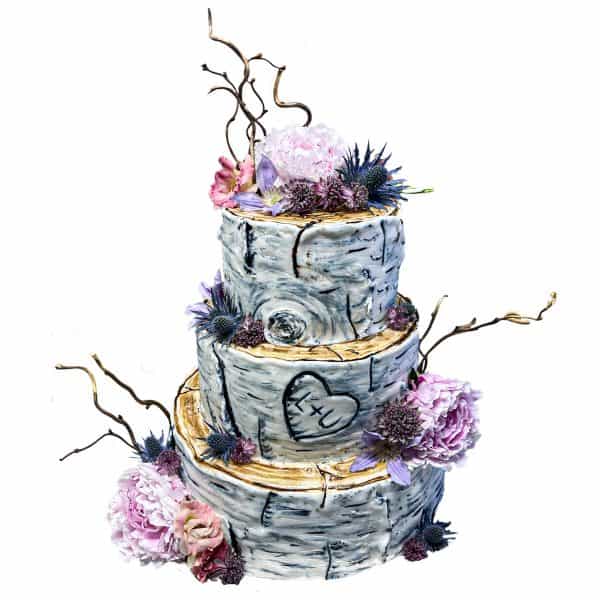 Hochzeitstorte dreistöckig "Baumscheiben" mit Blumen- und Astdekor