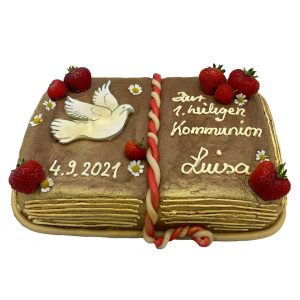 Kommunionstorte "Buch" mit Taube, Gänseblümchen und Erdbeeren