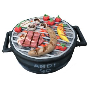Torte Grill mit detailliertem Grillgut - Pilze, Banane, Steak und Wurst
