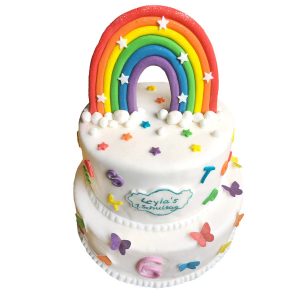 Torte rund zweistöckig mit Regenbogen, Schmetterlingen und Sternchen